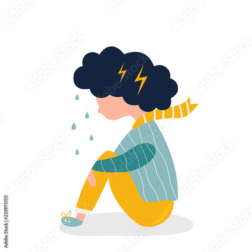 Sad and depressed girl sitting on the floor.