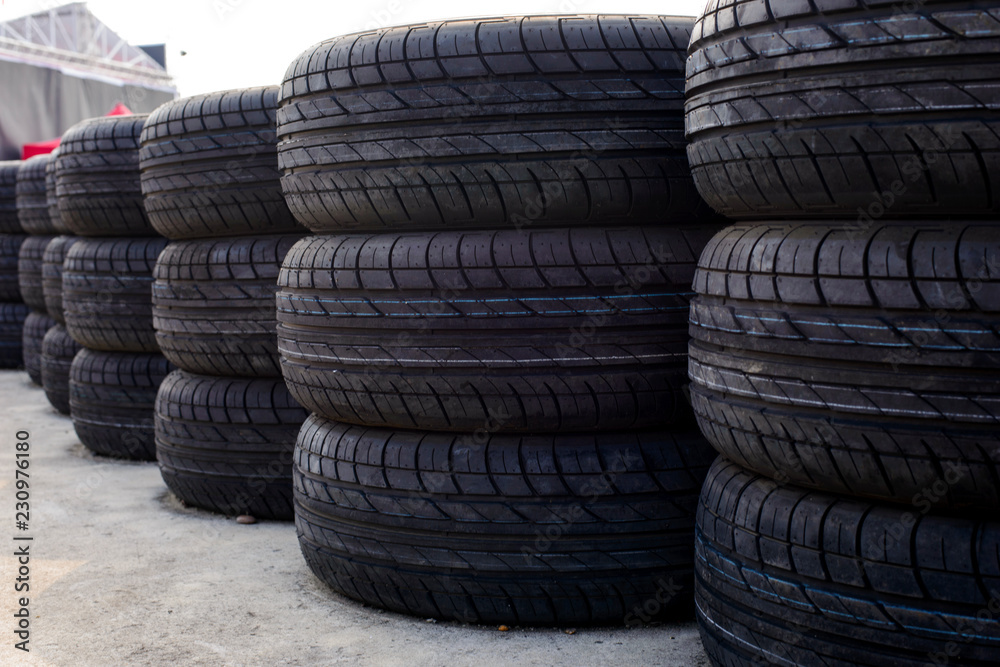 Stack of car tires on the floor Stack of car tires on the floor