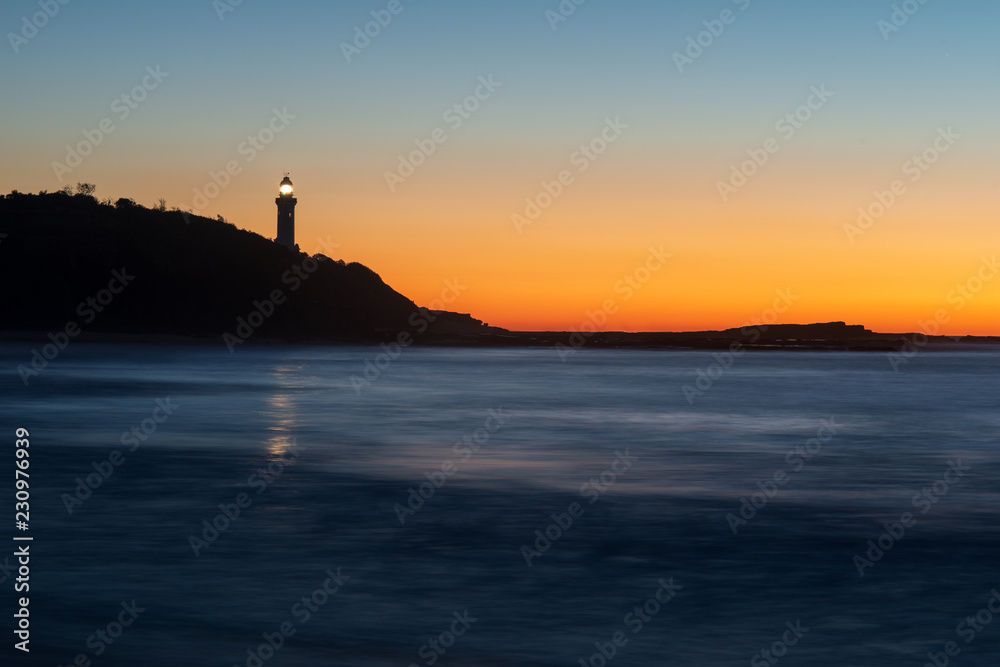 Sunrise at Crowdy Head Lighthouse, Australia. Golden sunrise on the Central Coast of New South Wales.