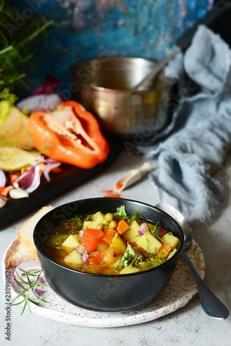 A bowl of delicious Italian vegetable soup Minestrone. Selective focus.