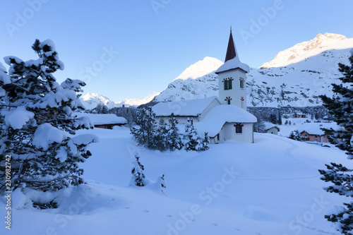 Chiesa Bianca surrounded by snow, Maloja, Bregaglia Valley, Engadine, Canton of Graubunden