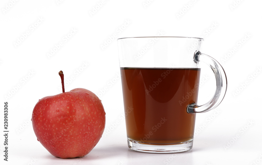 Apple and tea, cup of tea and delicious red apple isolated on white background - healthy diet Apple and tea, cup of tea and delicious red apple isolated on white background - healthy diet