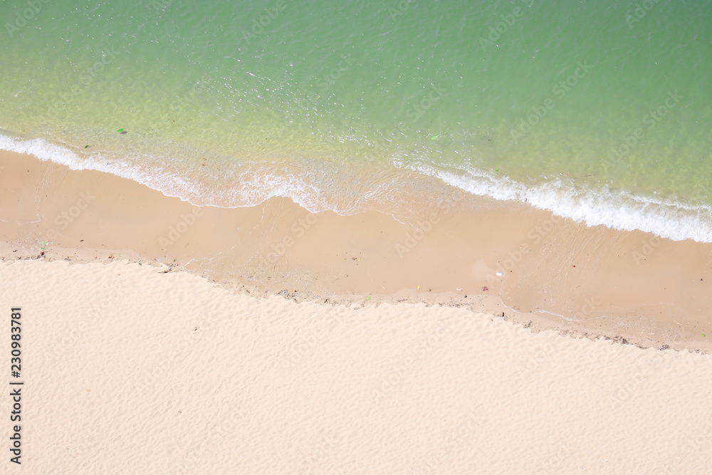 Top view background of beautiful tropical turquoise sea sand beach on outdoor summer holiday season.