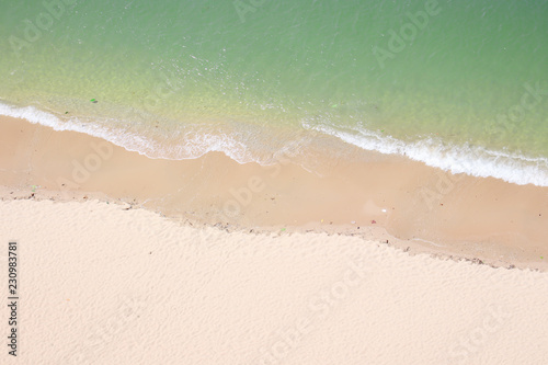 Top view background of beautiful tropical turquoise sea sand beach on outdoor summer holiday season.