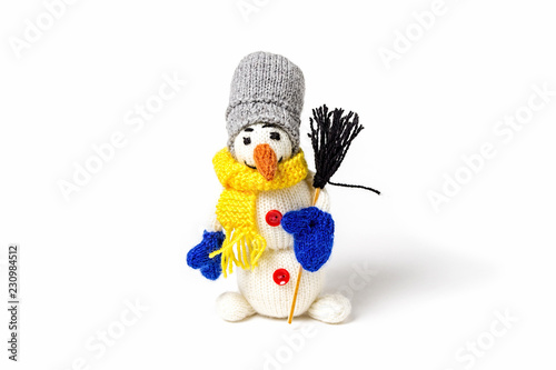 Snowman. Knitted handmade toys. Amigurumi. Hand made.