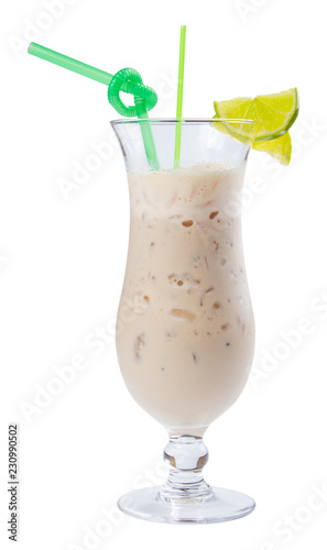 apple smoothie decorated with lime. refreshing drink in tall glass with ice and green straw