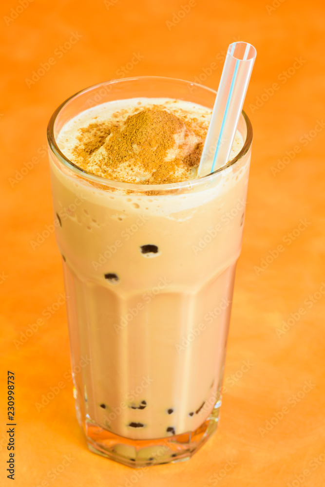 Chocolate milk Boba tea with tapioca balls. StockFoto Adobe Stock