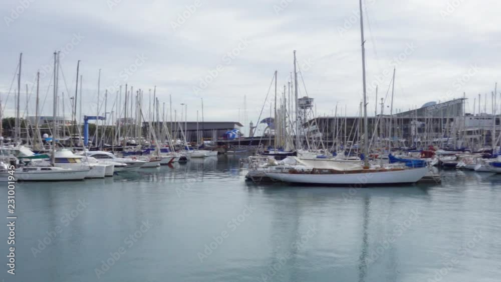 Panning view of Winter and cloudy day view of Port Vell in Barcelona, Spain. Panning view of Winter and cloudy day view of Port Vell in Barcelona, Spain.