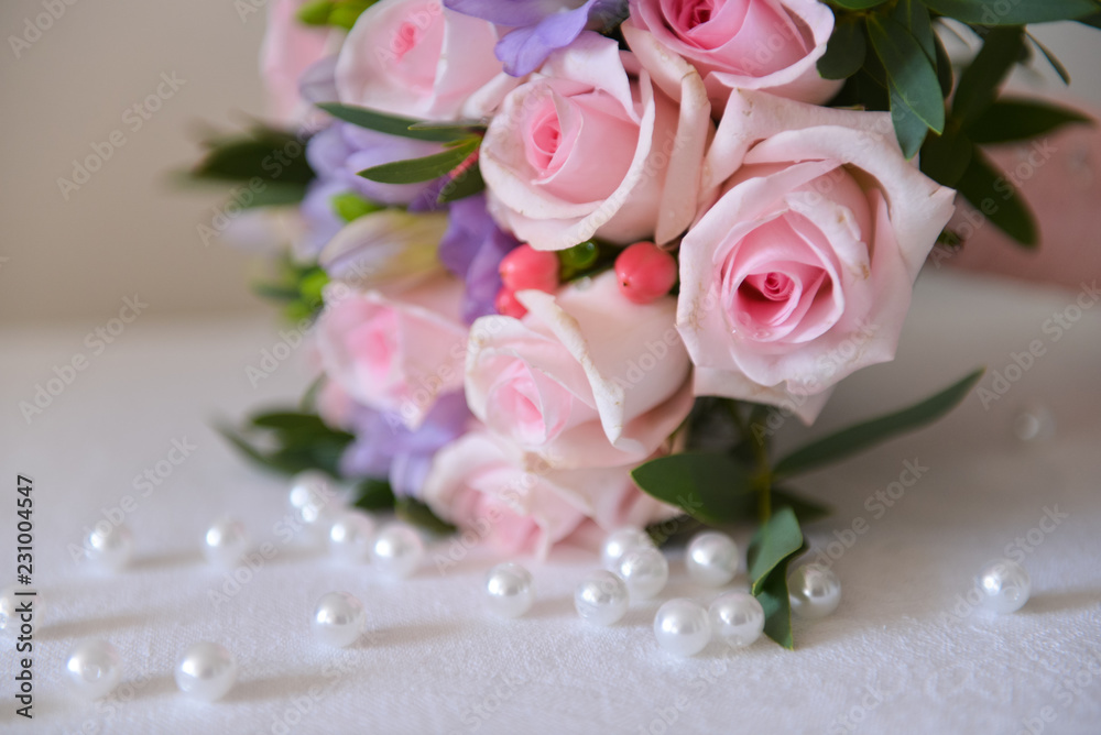 bridal bouquet of fresh roses on the table. wedding floristry, floristic decorative statement bridal bouquet of fresh roses on the table. wedding floristry, floristic decorative statement