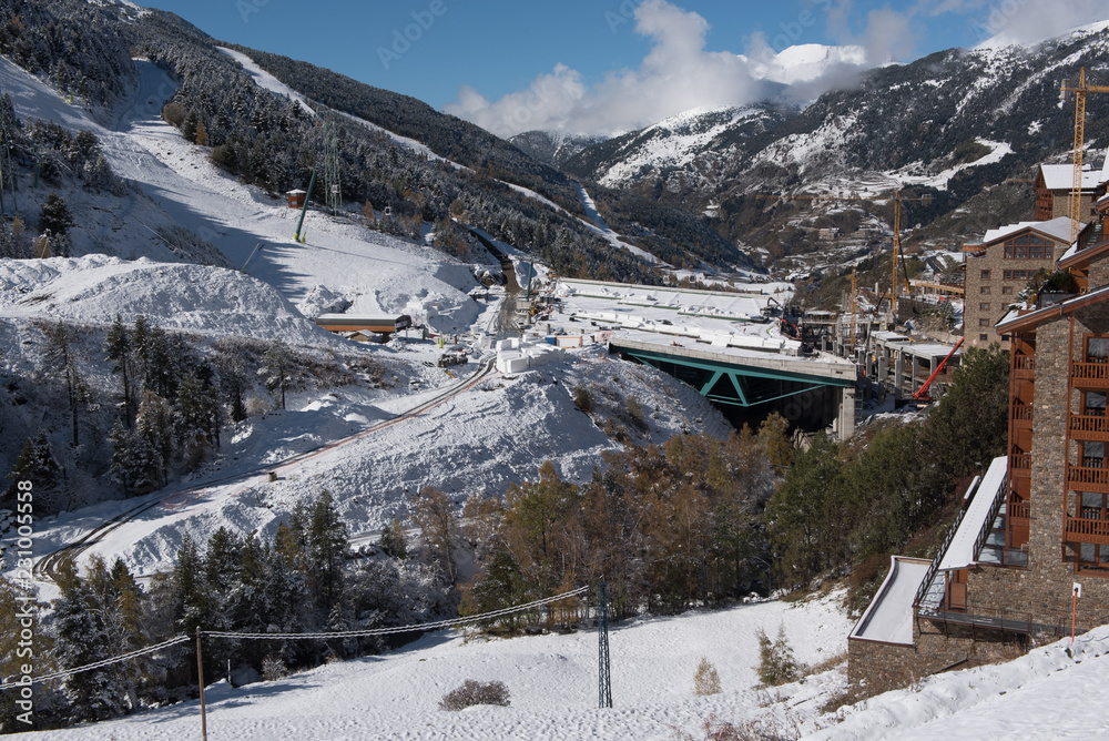 Beautiful landscape of Soldeu, Canillo, Andorra on an autumn morning in its first snowfall of the season. You can see almost completed the works of the track of the ski world cup of 2019.