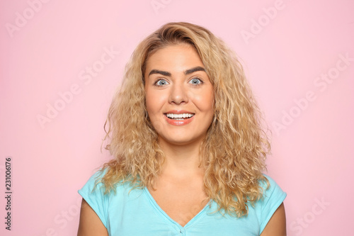 Portrait of happy young wom...