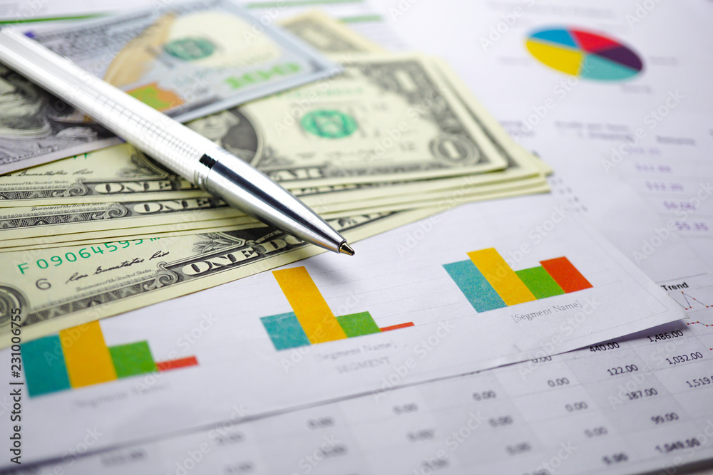 US dollar banknotes money on chart graph spreadsheet paper. Financial development, Banking Account, Statistics, Investment Analytic research data economy, trading, office reporting Business c US dollar banknotes money on chart graph spreadsheet paper. Financial development, Banking Account, Statistics, Investment Analytic research data economy, trading, office reporting Business c