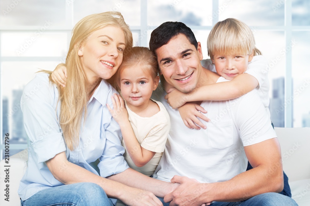 Beautiful smiling family on background