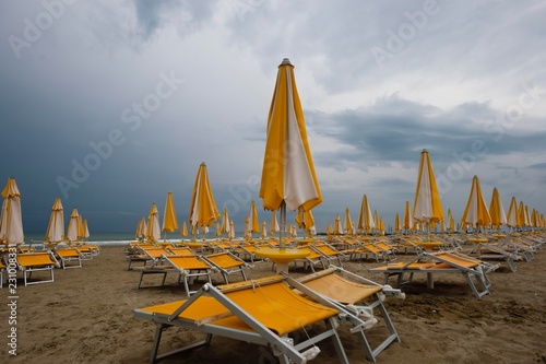 Abandoned beach chairs on the beach, Adriatic sea, Union Lido, Cavallino Treporti, Veneto, Italy, Europe photo