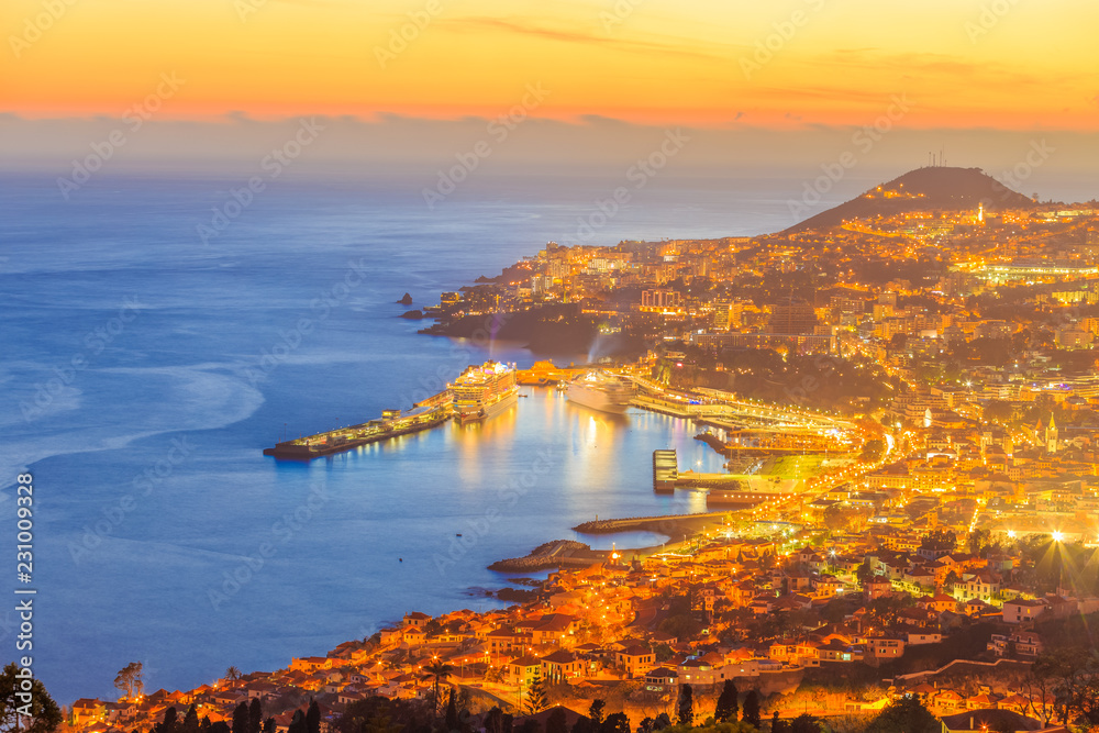 Scene of Funchal capital illuminated at twilight hour, in Madeira, Island - Portugal