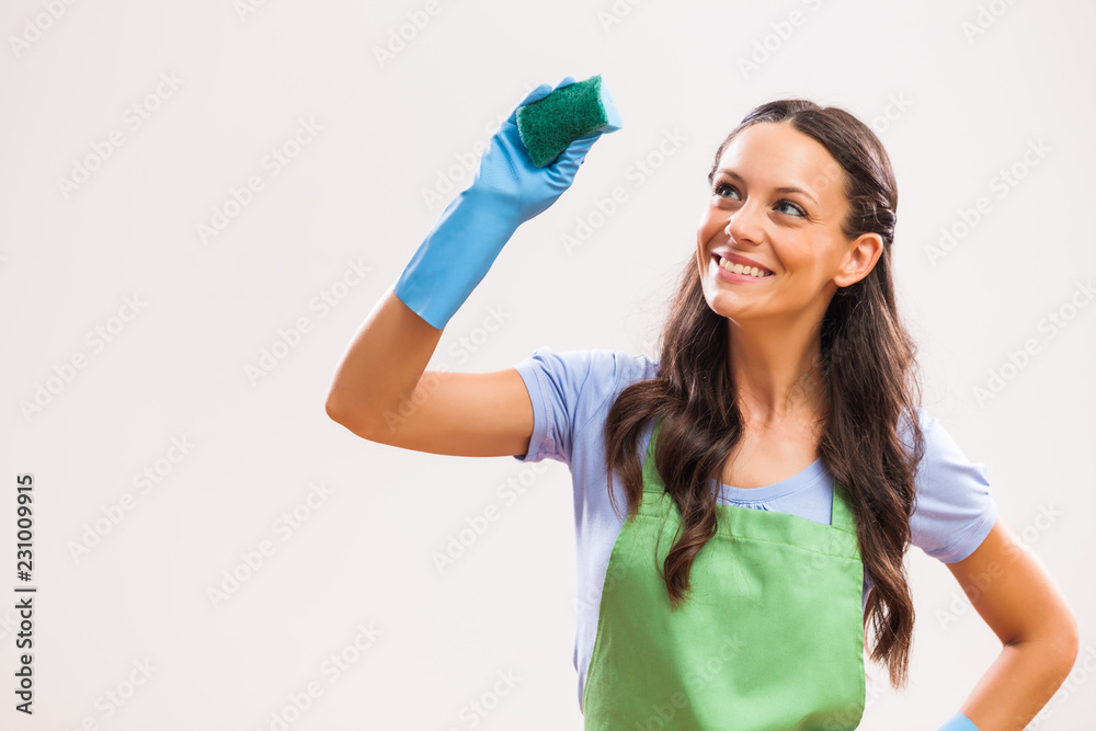 Portrait of housewife who is obsessed with cleaning. Portrait of housewife who is obsessed with cleaning.