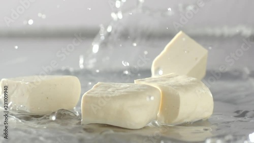 Tofu falling and water splash out,  Cooking food