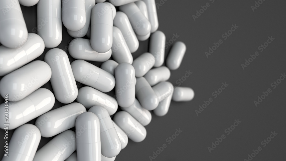 Pile of white medicine capsules