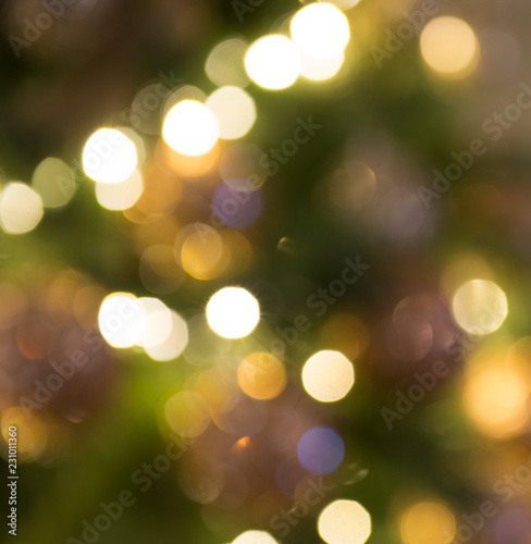 Blurred light bokeh with Christmas tree