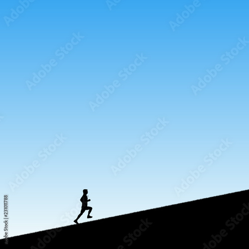 Photo Man runs uphill in park