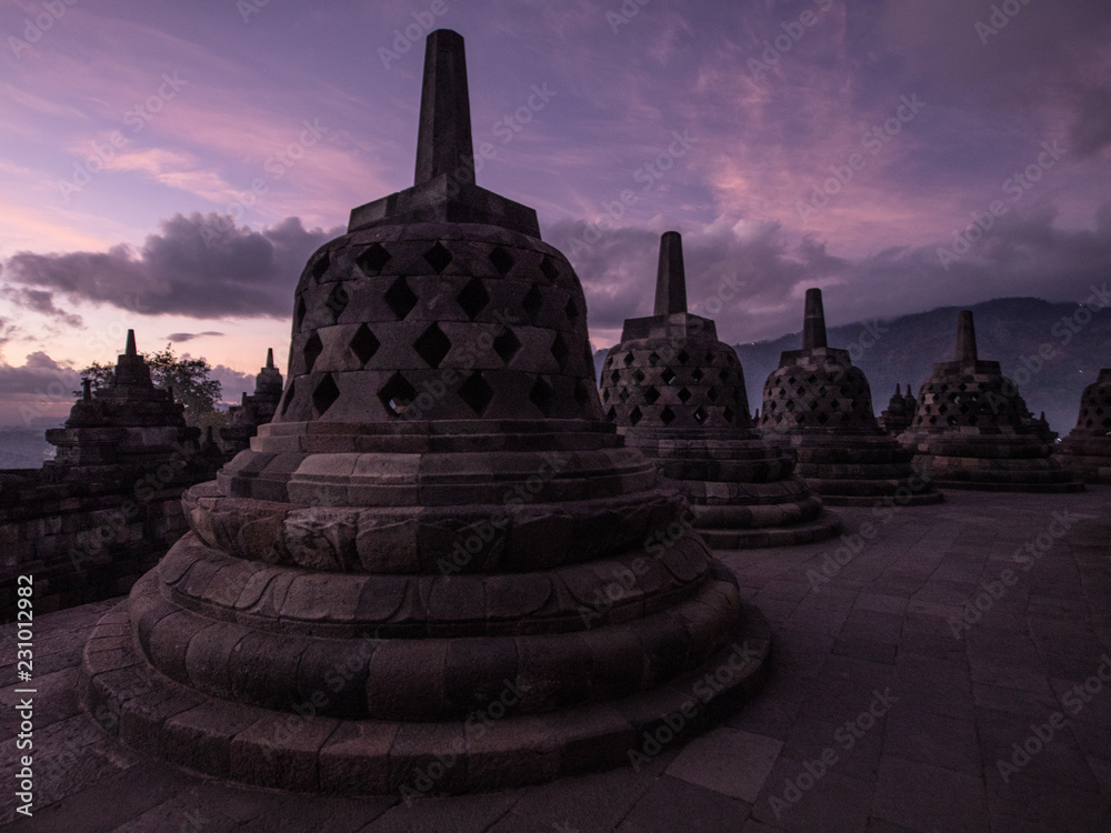 Beautiful sunrise purple sky at the Borobudur ancient temple in East Java, Indonesia
