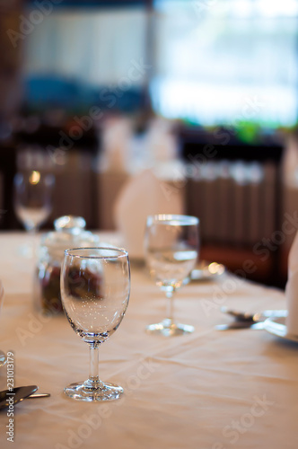 Selective focus of empty wine glass on the banquet table