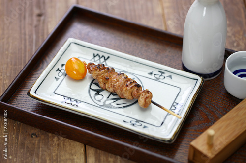 yakitori, japanese grilled chicken skewers, very rare chouchin (immature egg yolk)
