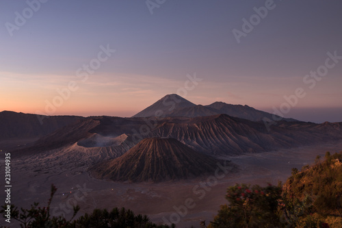 Sunrise pink skies over the Mount Bromo caldera in East Java, Indonesia