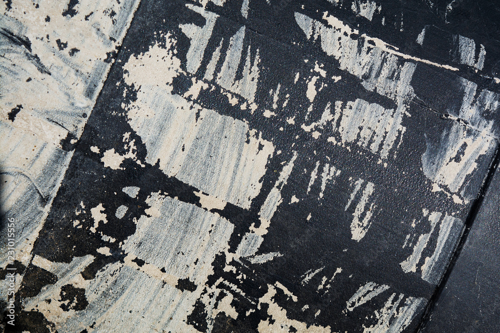 Fototapeta premium white smears on black plastic