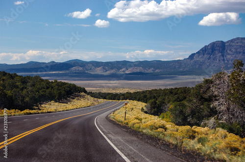 road in between American mountains