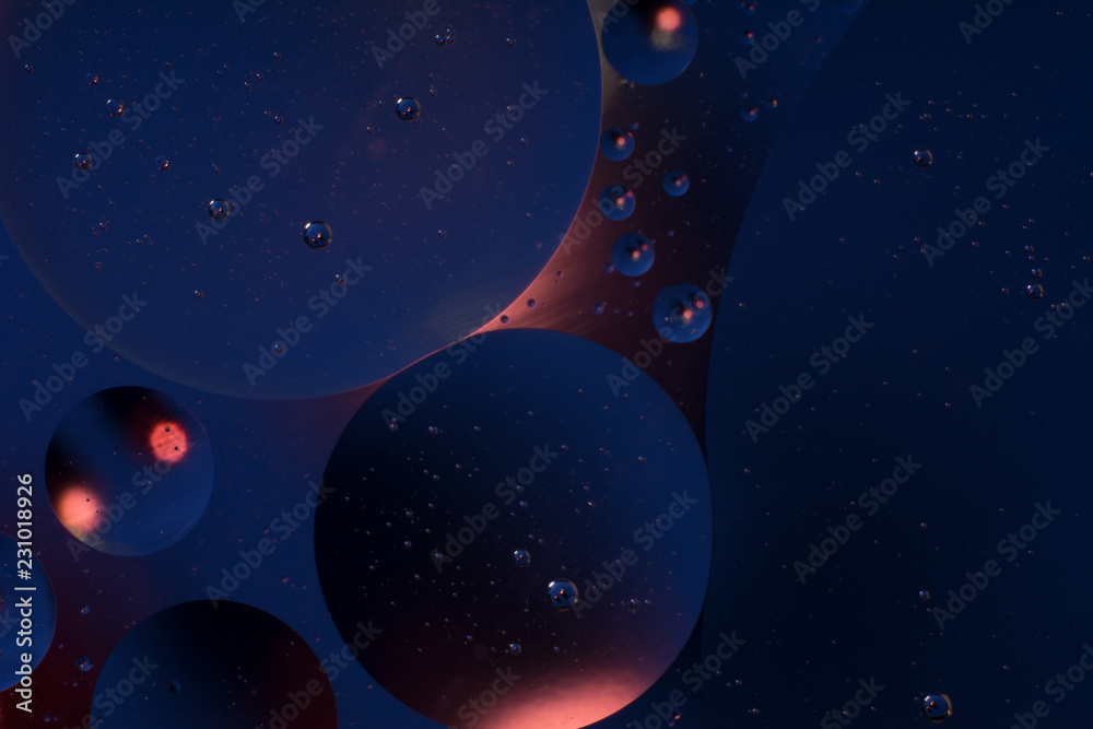 oil bubbles on a red blue background space background