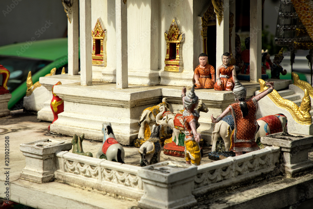 Fototapeta premium Close up shot of small temple model of buddhist spirit house in Bangkok, Thailand