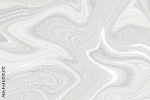 The marble is white. Background with a blurry pattern of light color.