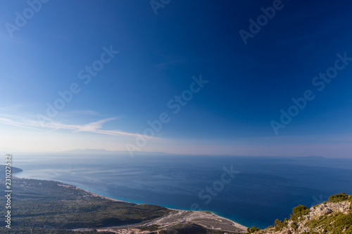View from the top of the sea and mountain serpentine. The seaside near the mountains © A_Skorobogatova