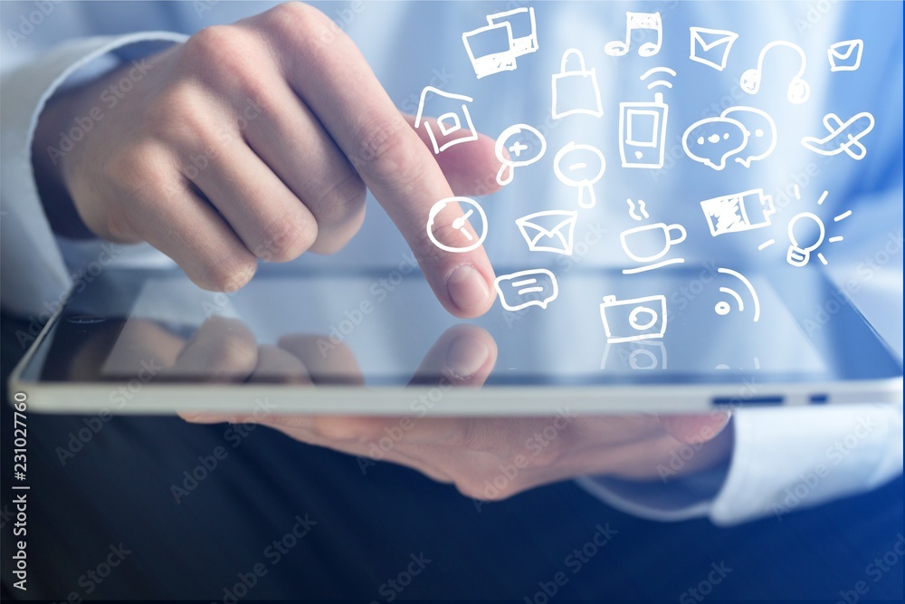 Businessman using tablet pc on background Businessman using tablet pc on background