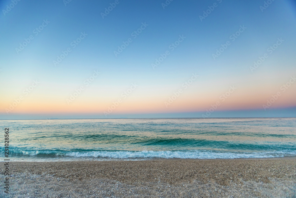 Coastline of the beach on the unfocused background