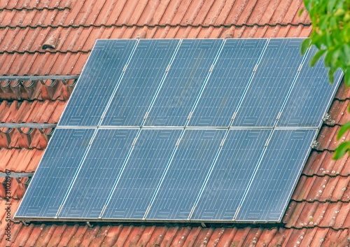 Roof of a house with a photovoltaic system