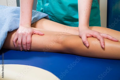 Osteopath doctor conducts the patient’s feet treatment