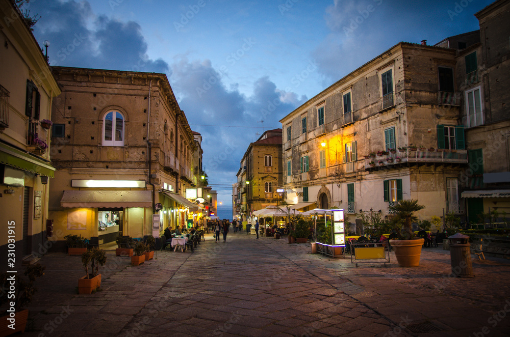 Streets of town, cafes and restaurants in the evening, Tropea, Italy