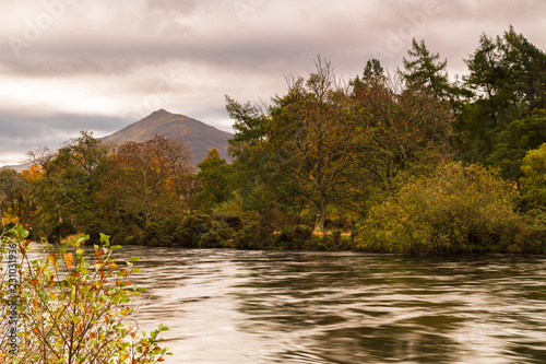 An autumnal image of Shiehallion and the river Tummel in Perth and Kinross, Scotland. photo