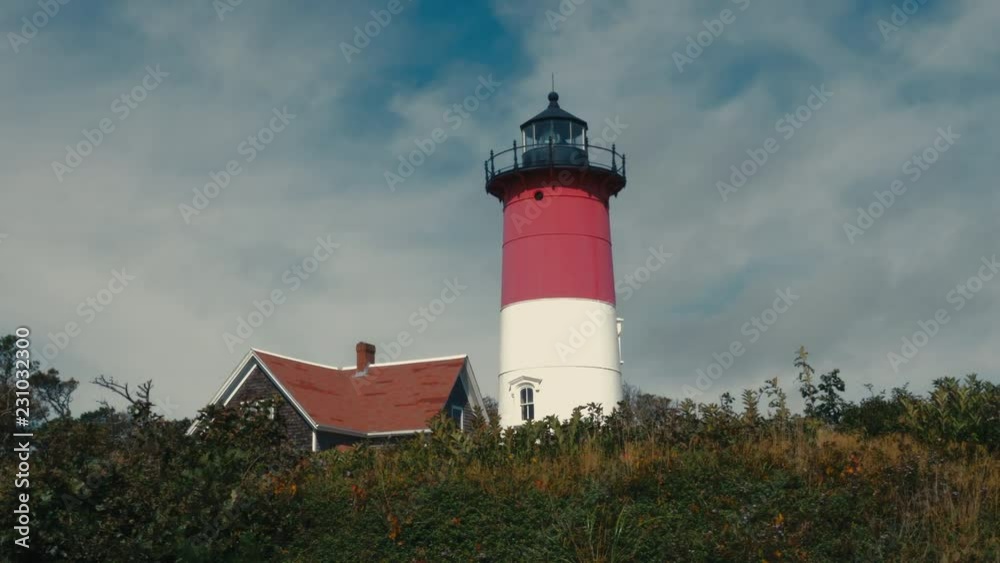 View of Nauset Light, one of the Three Sisters Lighthouses on Cape Cod, USA. 4K UHD View of Nauset Light, one of the Three Sisters Lighthouses on Cape Cod, USA. 4K UHD