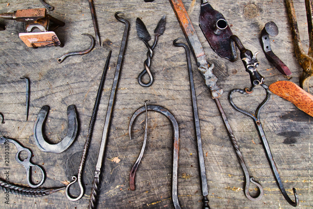 Lay flat of antique, vintage blacksmith tools Stock Photo