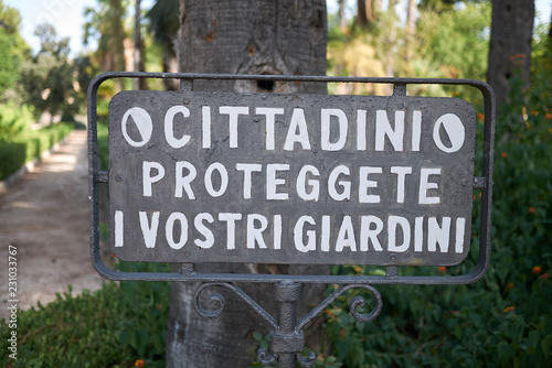 Palermo, Italy - September 06, 2018 : Sign at Villa Giulia (Citizens respect your gardens) photo