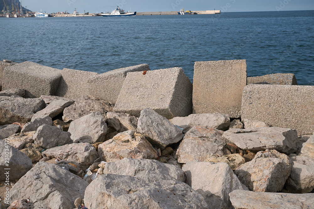 Palermo, Italy - September 06, 2018 : Concrete breakwater Palermo, Italy - September 06, 2018 : Concrete breakwater