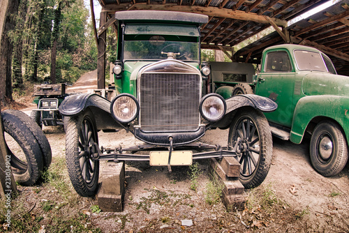 An antique, vintage car and truck
