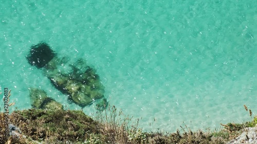 Clear rippling calm sea at Pedn Vounder Beach, South Cornwall on a hot sunny June day.