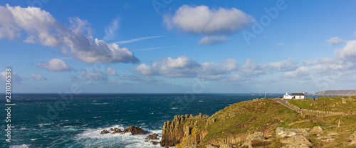 Photography View of the cliffs at Lands End the western most point in Cornwall, England unde