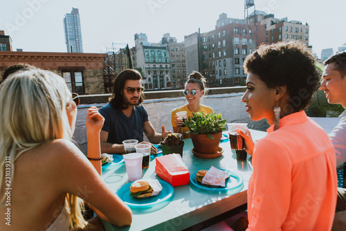 Photography Group of friends apending time together on a rooftop in New york city, lifestyle