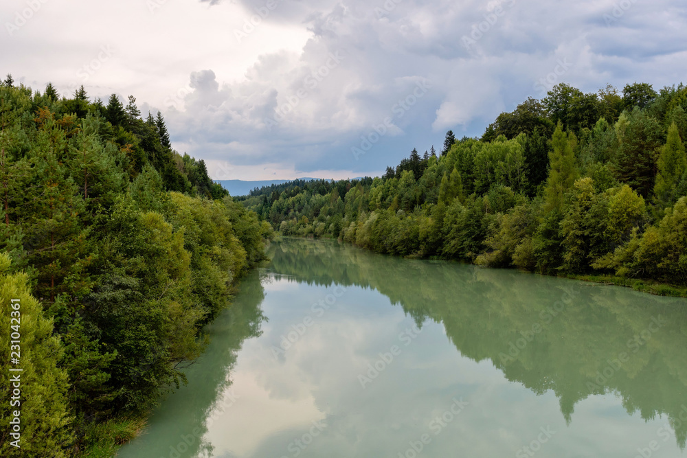 Forest river reflection landscape. Autumn forest river water panorama. Forest river reflection in autumn