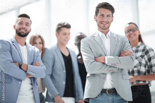 young colleagues during a meeting at the office stand with their